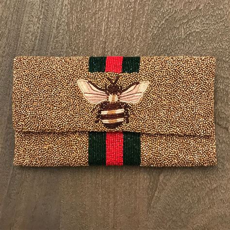 beaded gucci bee clutch